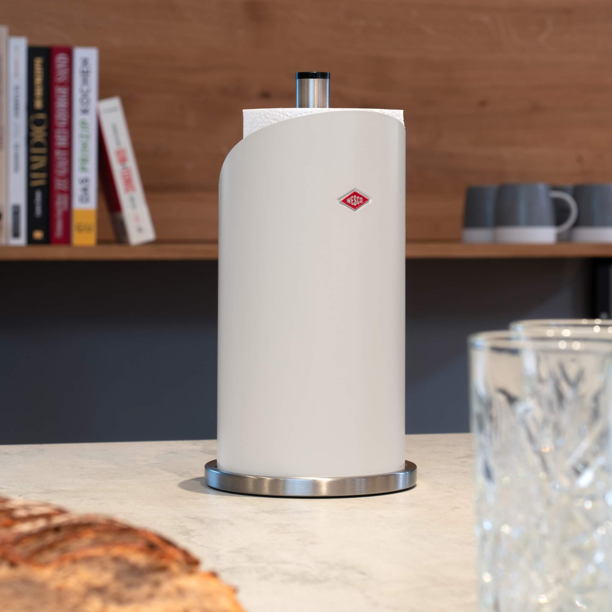 Wesco Paper roll holder in matt sand on a stone kitchen worktop