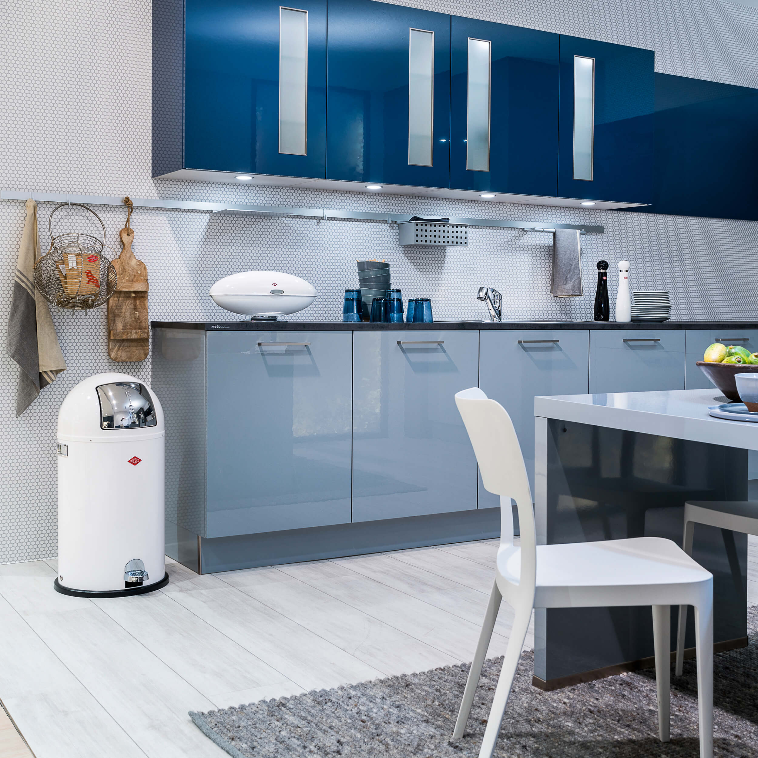 Wesco Kickboy pedal bin in White lifestyle in modern blue coloured kitchen