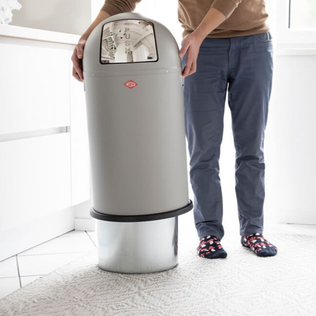 Pushboy 50L being emptied with the outer shell lifted up and over the inner bin