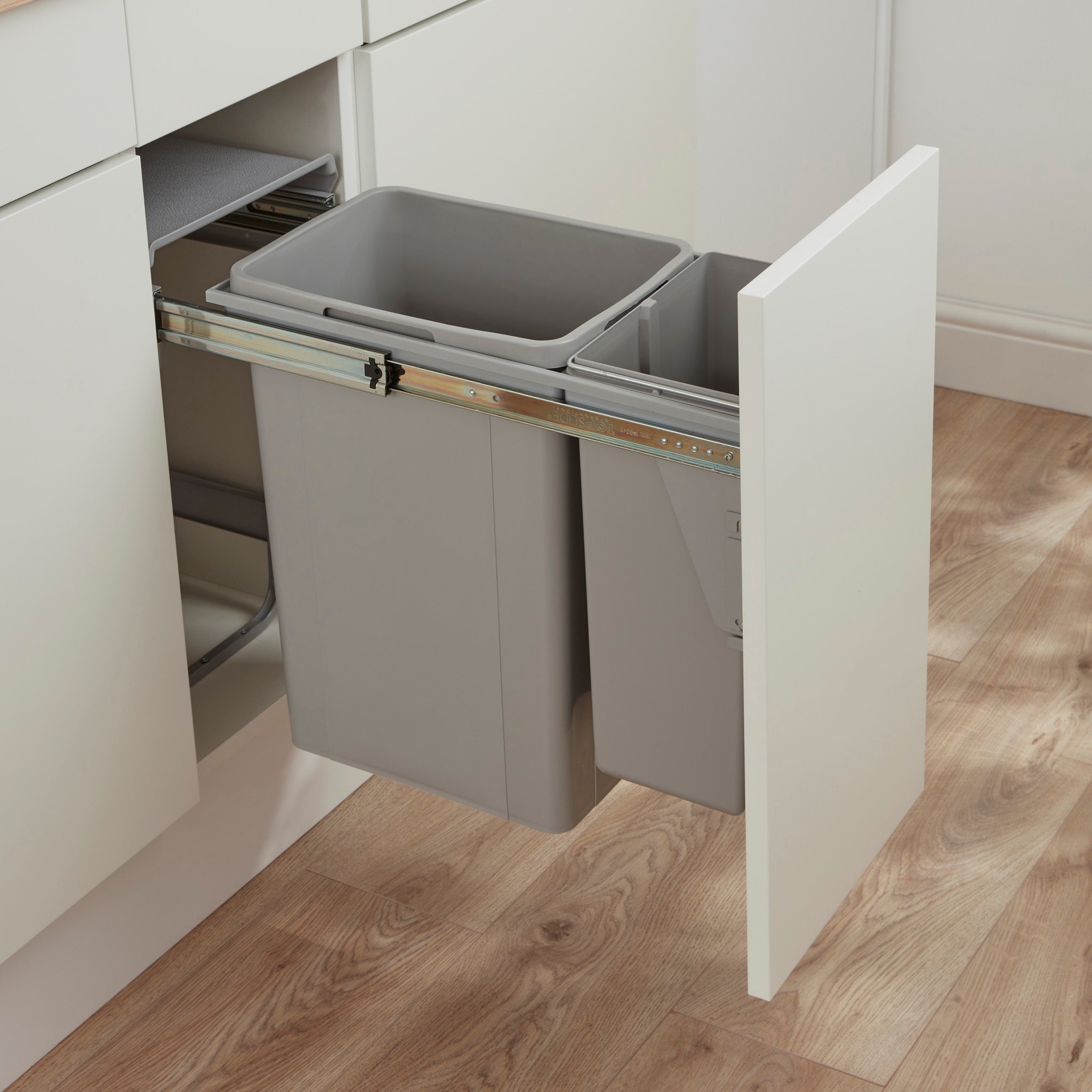 Wesco traditionline Bio Double 300mm Alu Grey built-in waste bin system mounted to a kitchen cabinet door, featuring two compartments.