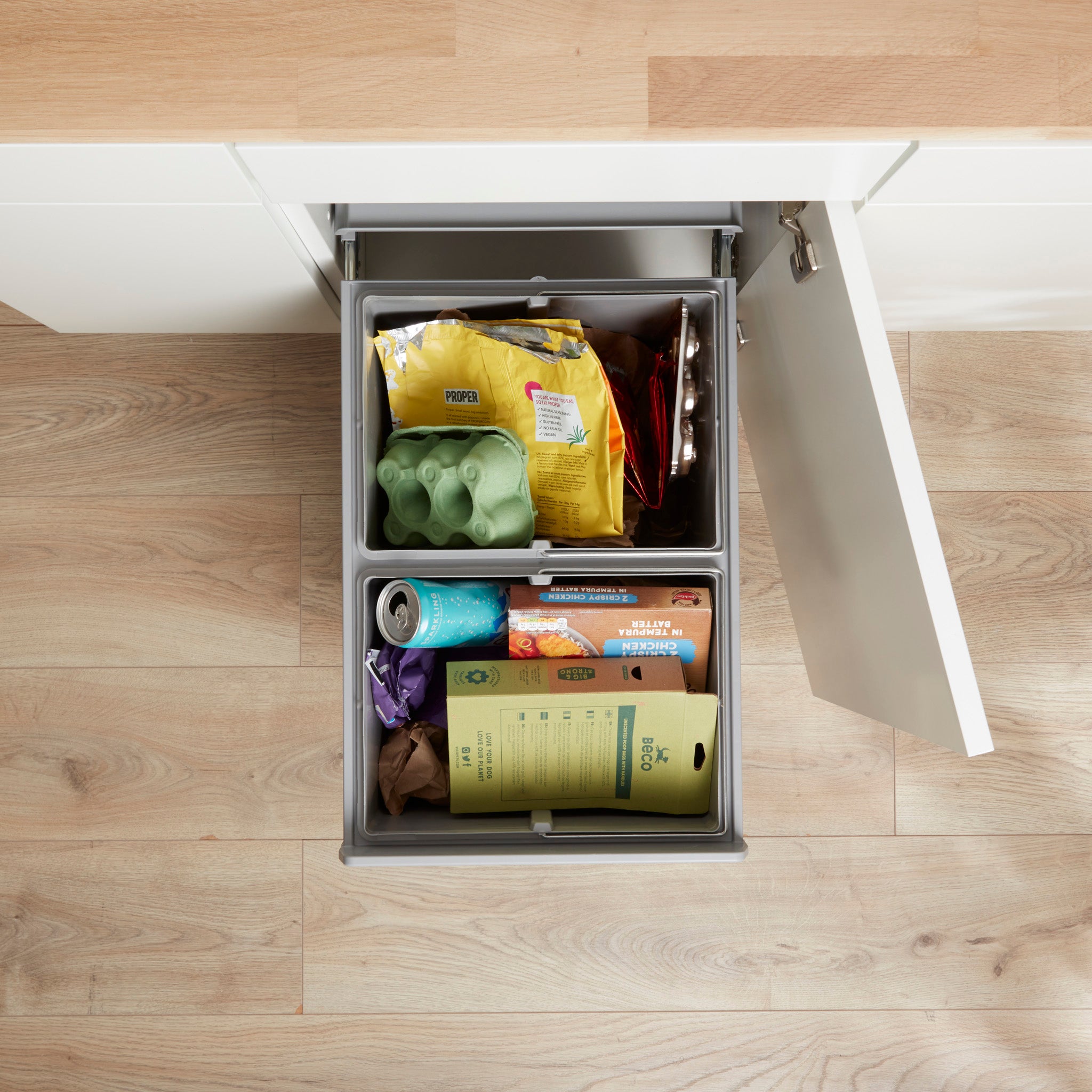 Above lifestyle view of the Wesco Double Master 32L inside a kitchen cabinet