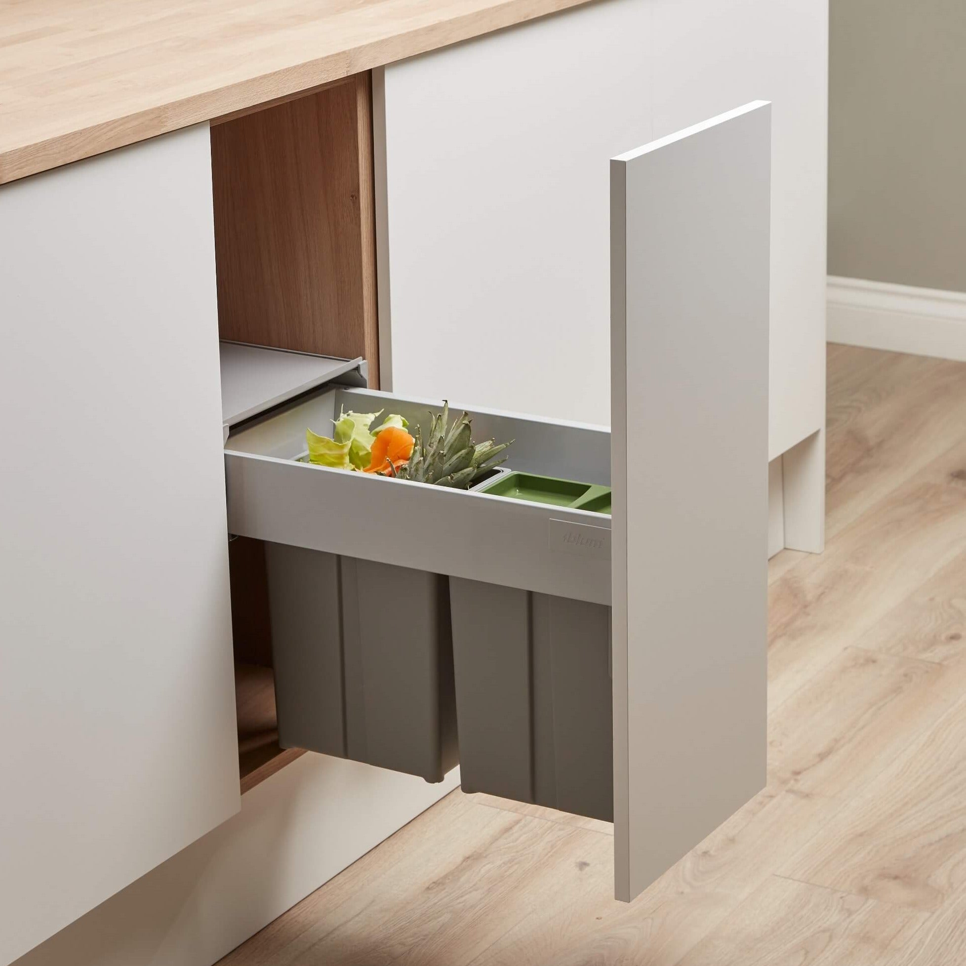 Wesco Pullboy Z 300mm wide cabinets lifestyle image with bio waste green lid