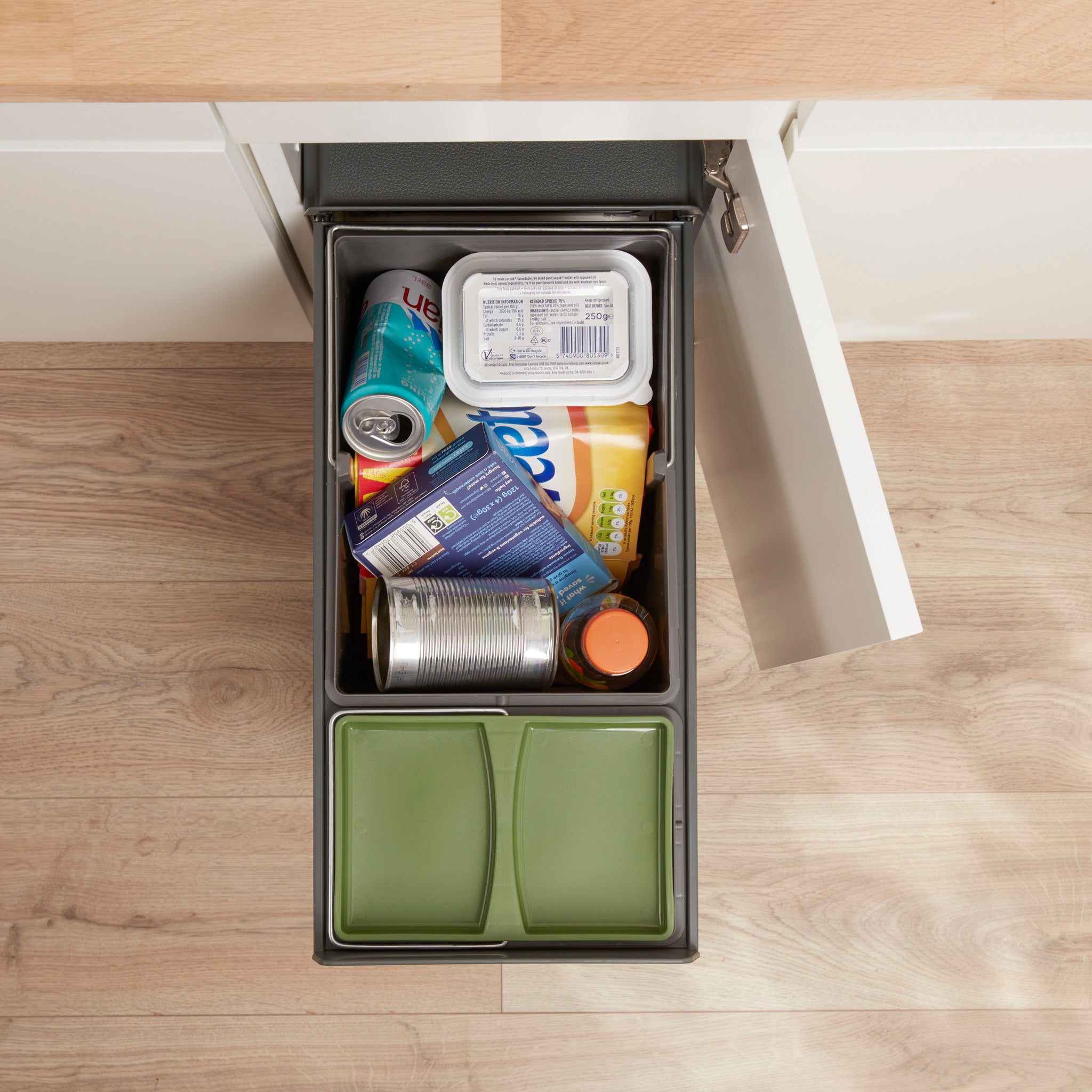 Wesco Profiline Bio Double 30L lifestyle image from above showing 2 compartments, one with a green lid and the other filled with recycling