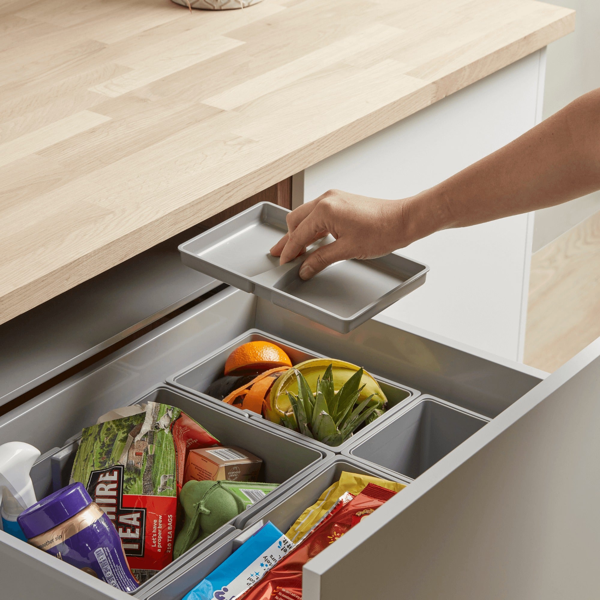 Multi-compartment Wesco Pullboy Z bin system demonstrating the individual lids.