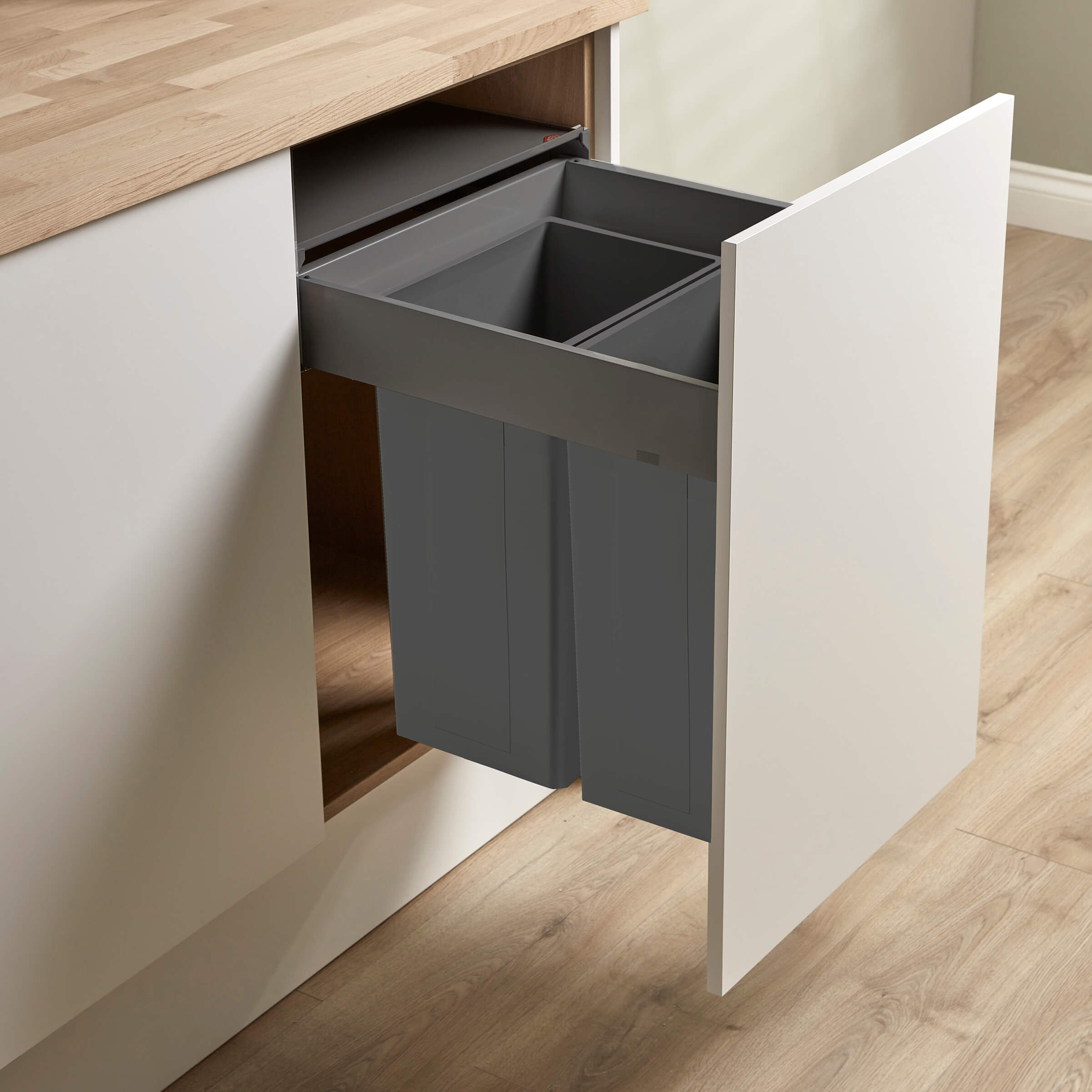 Dark Grey Wesco Pullboy Z Merivobox 500mm 2 compartment pull-out integrated bin in a kitchen cabient.