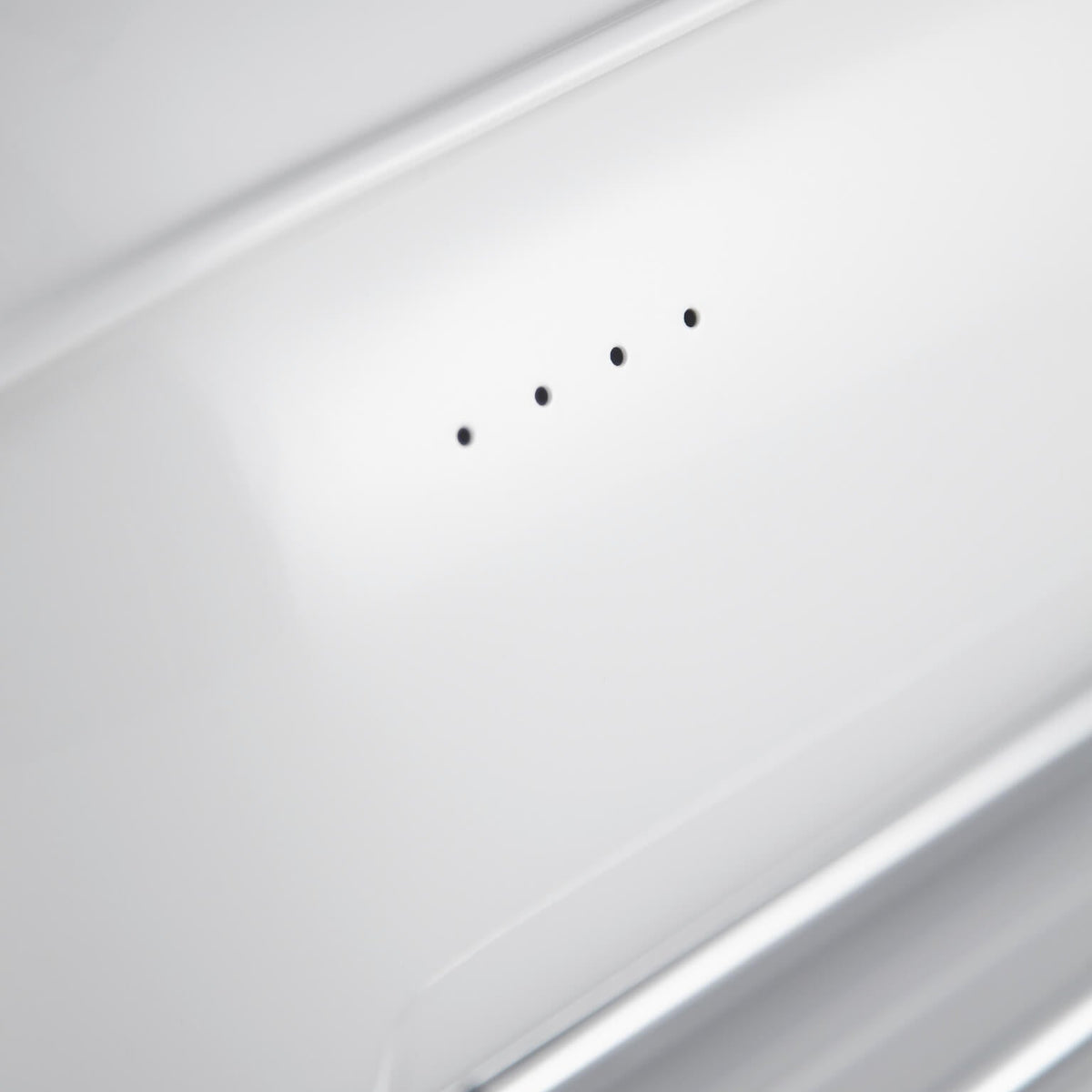 Close up image of the ventilation holes on the back of the Wesco Breadboy bread bin