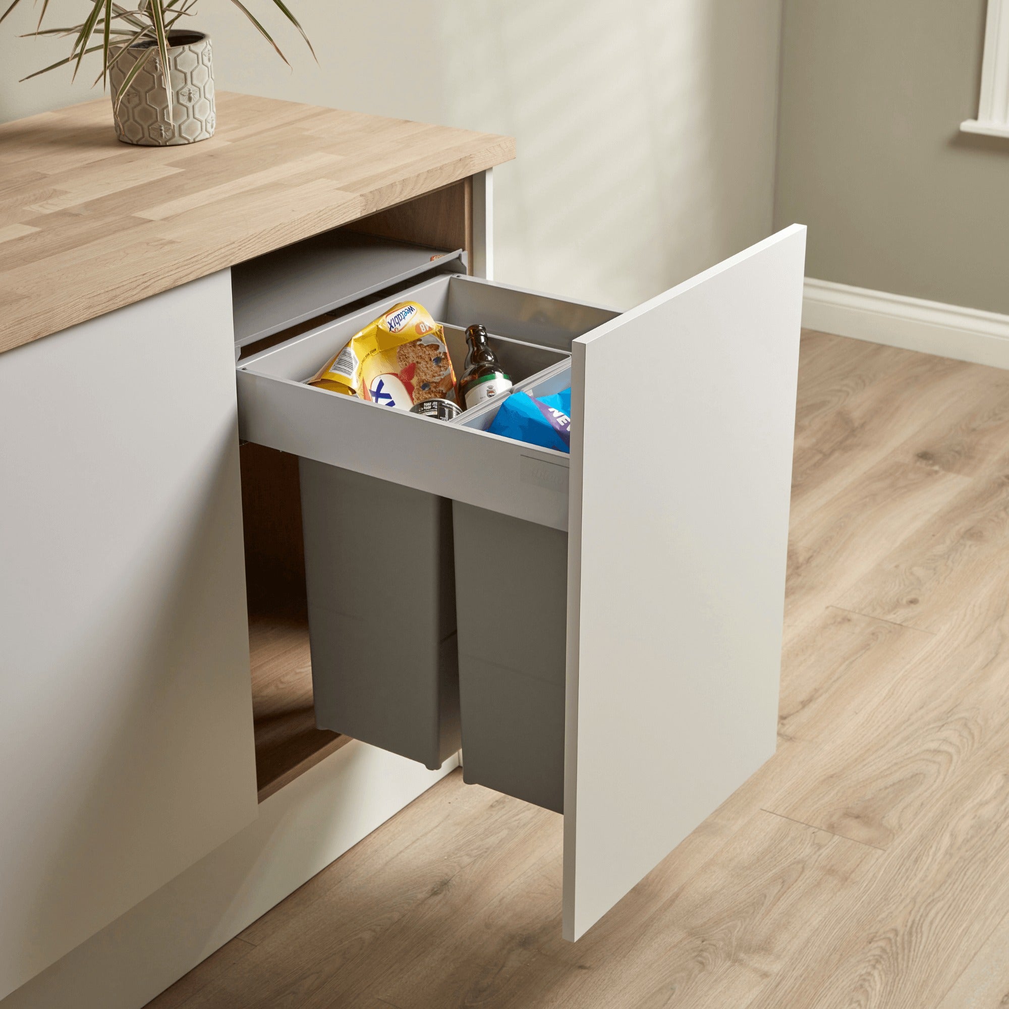 Wesco Pullboy Z 500mm 2 x 29L inner bins in light grey filled with recycling. Fitted within a kitchen cabinet. 